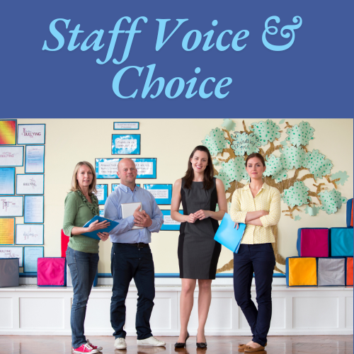Staff standing in a line together smiling